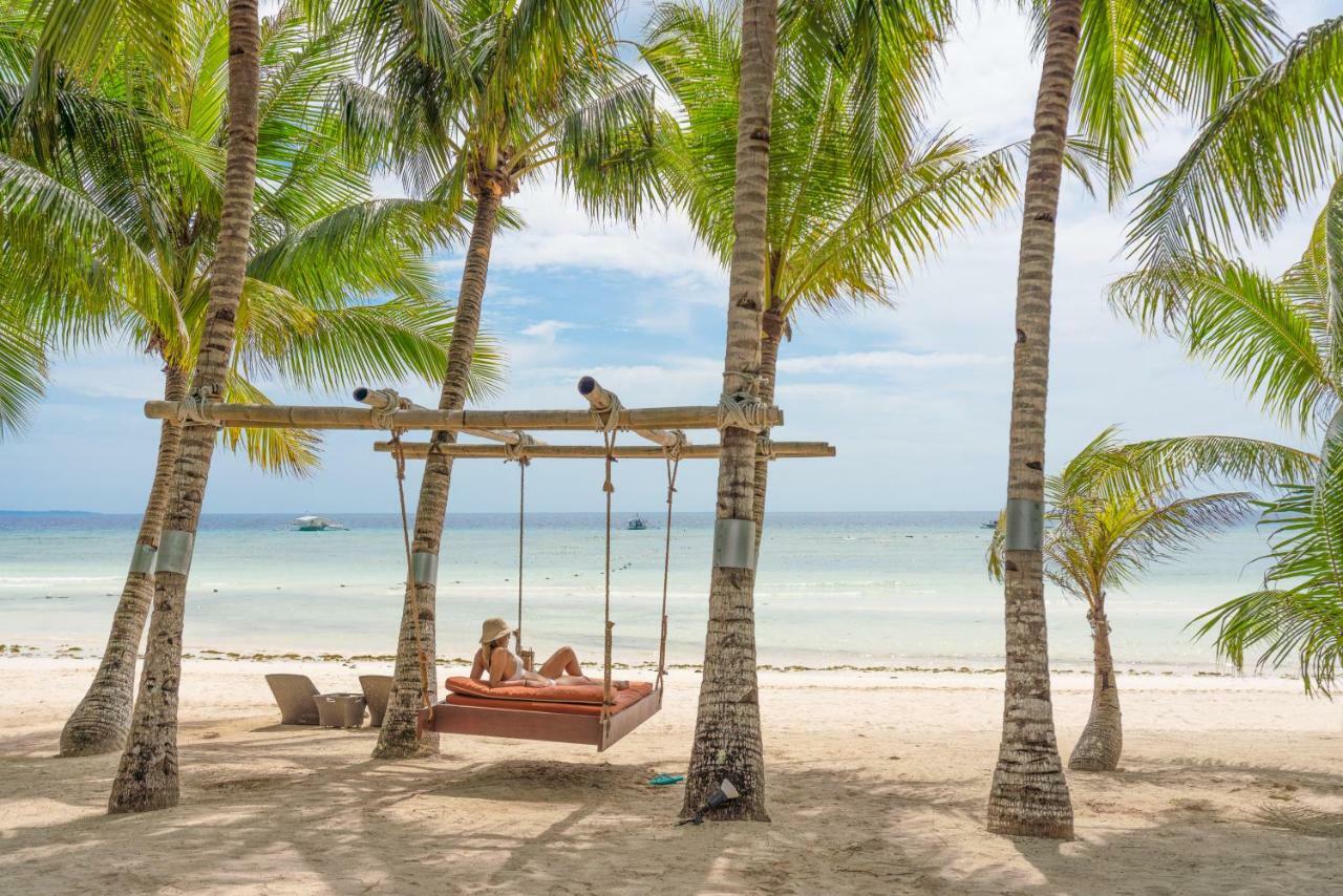 Oceanica Resort Panglao, Bohol Exterior foto A swing at the beach